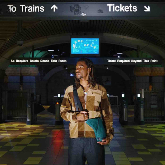 Puffco journey bag green person train station