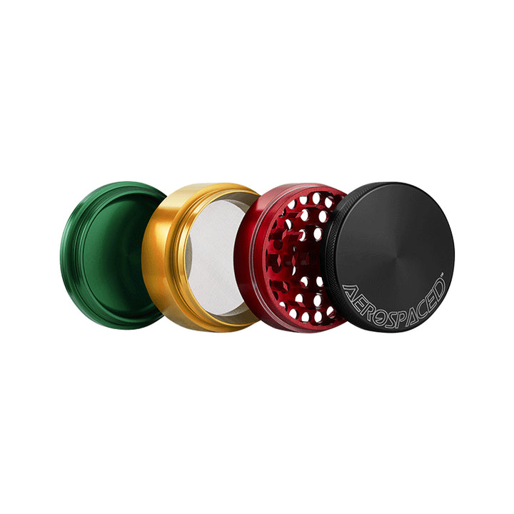 An open large Rasta coloured 4 piece Aeropspaced grinder.