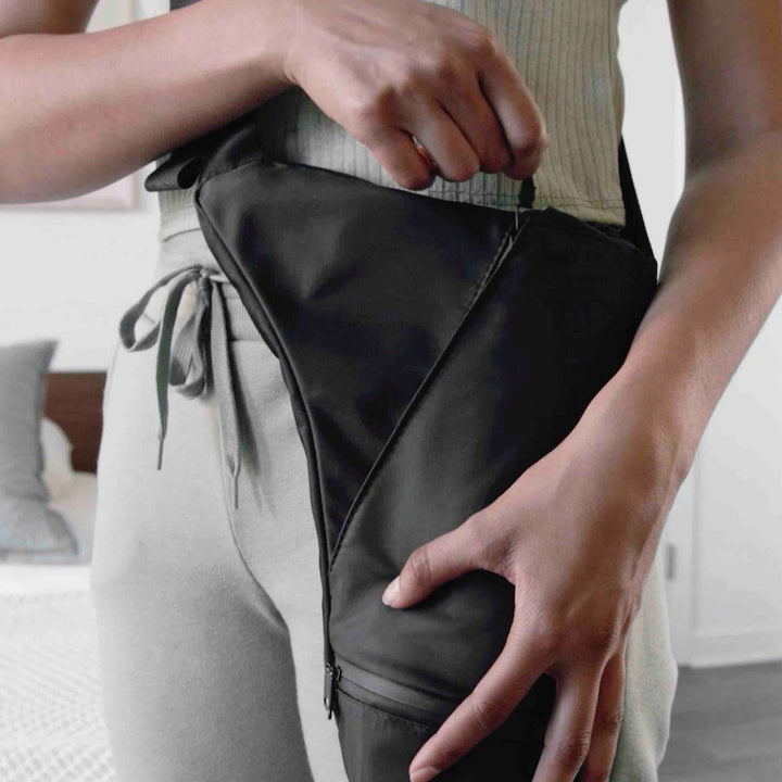 Black Puffco journey bag on person