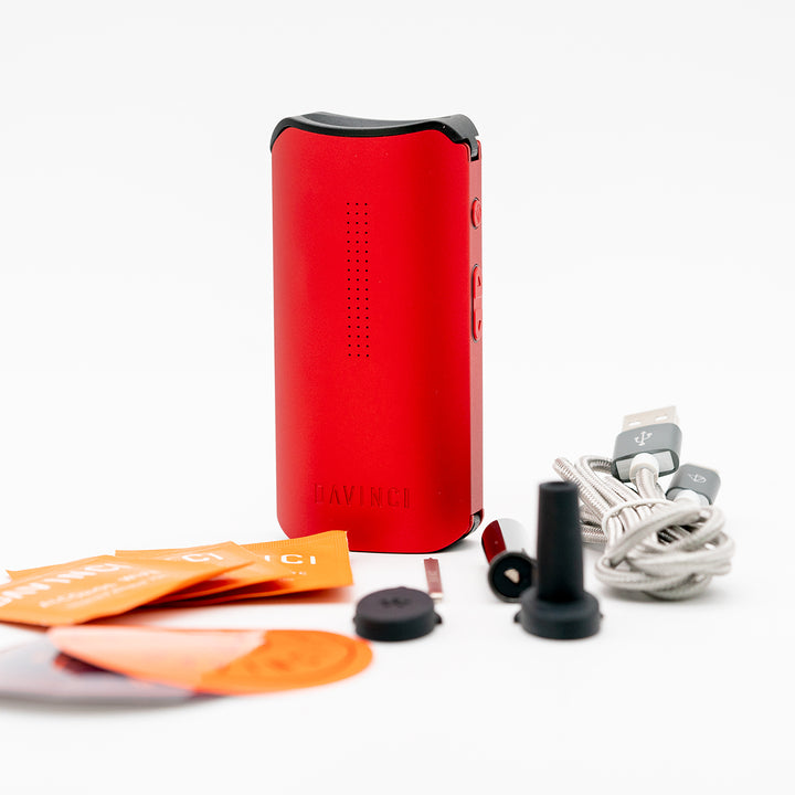Red IQC and accessories against a white background.