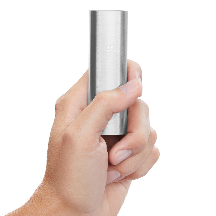 A womans hand holding the Platinum Pax 2 up close.