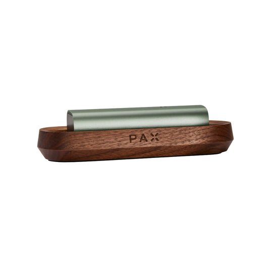 The Sage Pax 3 charging on the Wooden tray.