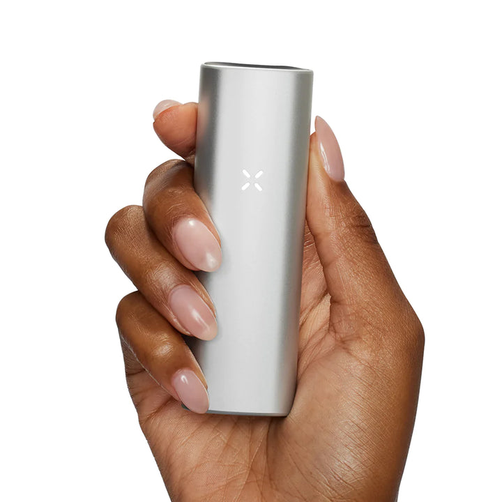 pax mini silver vaporizer in hand