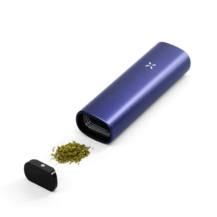 Periwinkle Pax Plus with open oven, next to dry herbs.