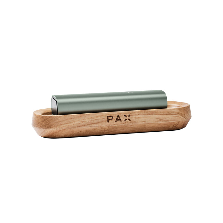 The Sage Pax 3 charging on the Wooden tray